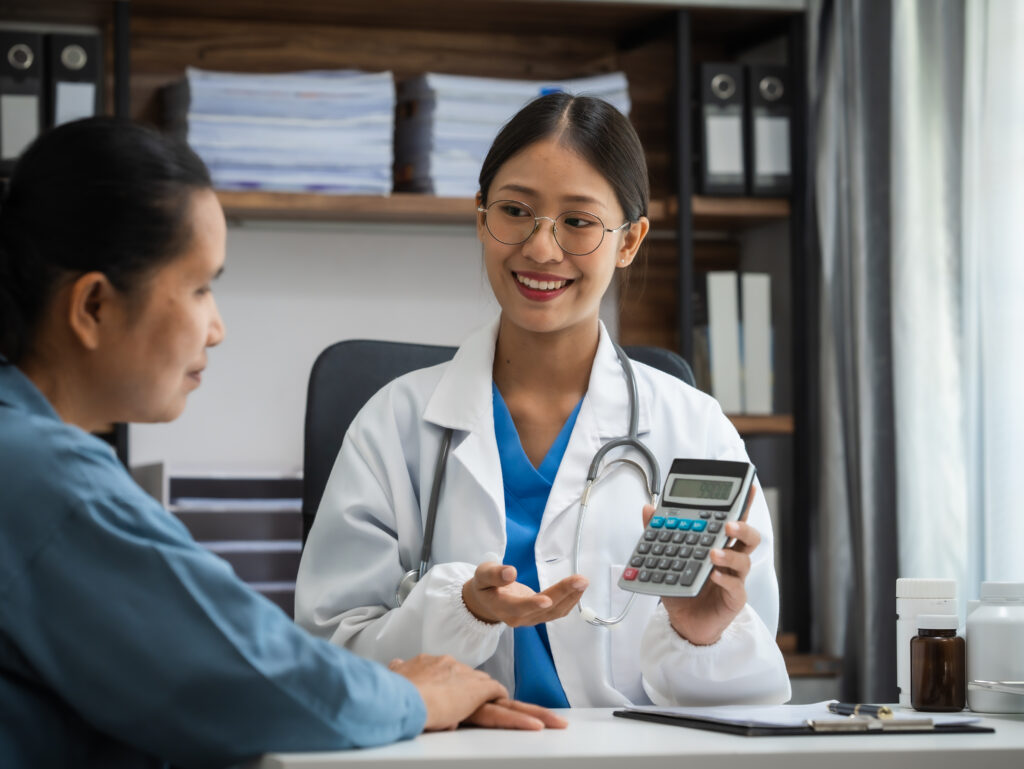 Mature woman in consultation with a doctor with abdominal pain. depression.