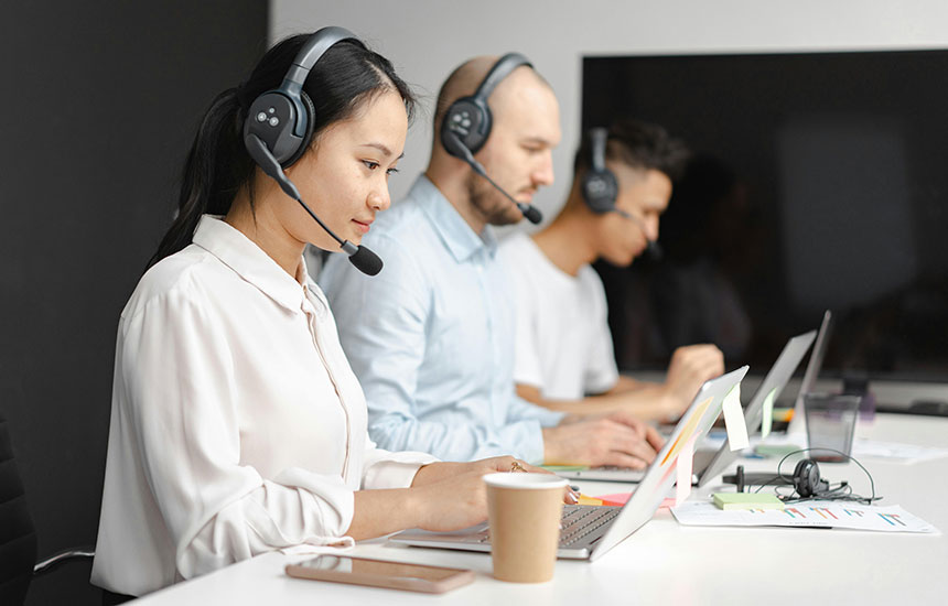 Outsourced shared agent team handling customer service tasks efficiently